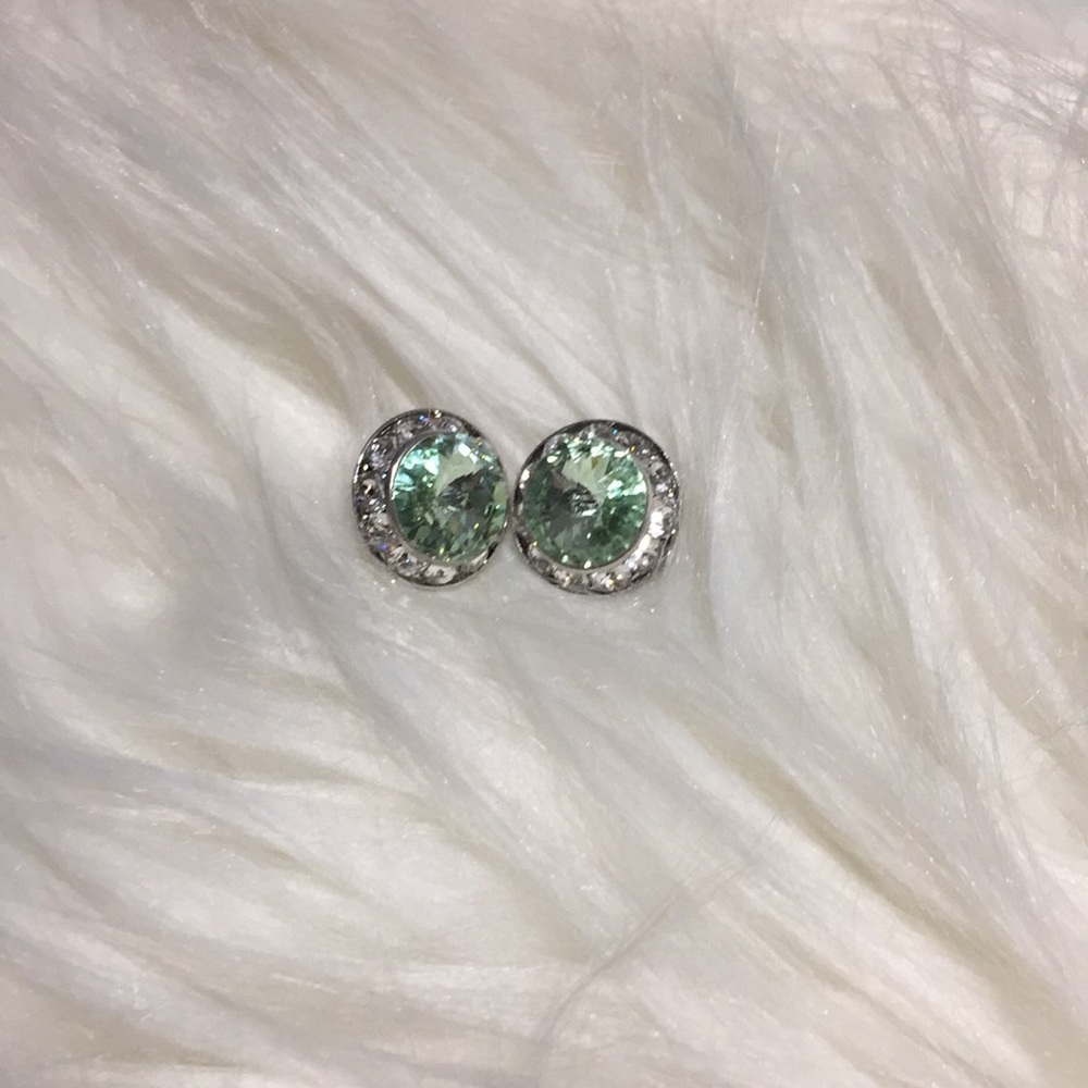 Silver and peridot earrings.